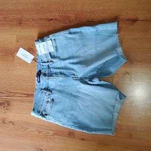 Calvin Klein jeans mid rise shorts distressed bottom brand new with tags